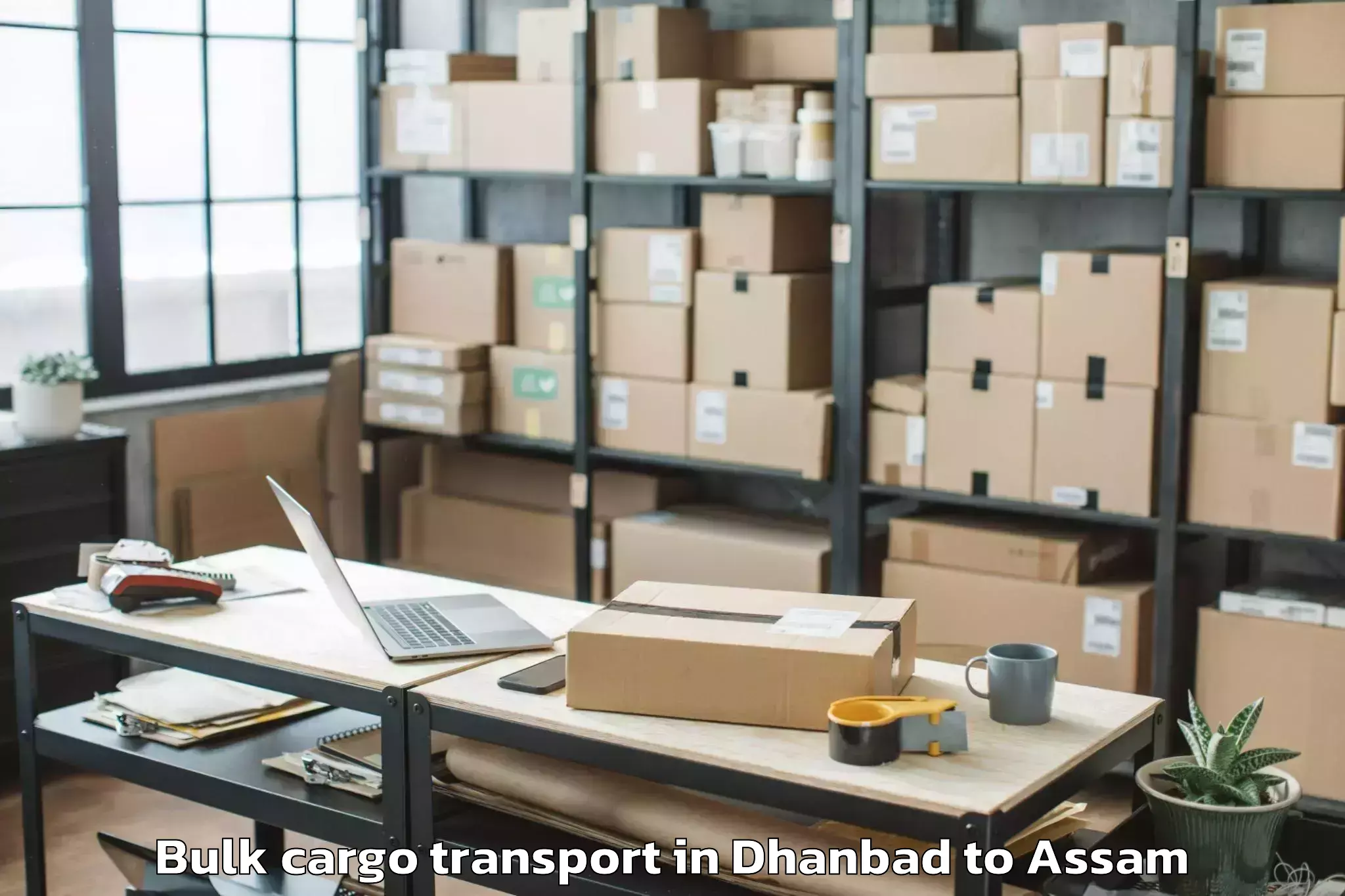 Book Dhanbad to Rupsi Airport Rup Bulk Cargo Transport